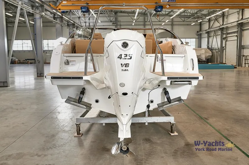 Slide: The Image of 2023 Yamarin 88 boat in a warehouse, rear view with 425 V8 engine. - 17