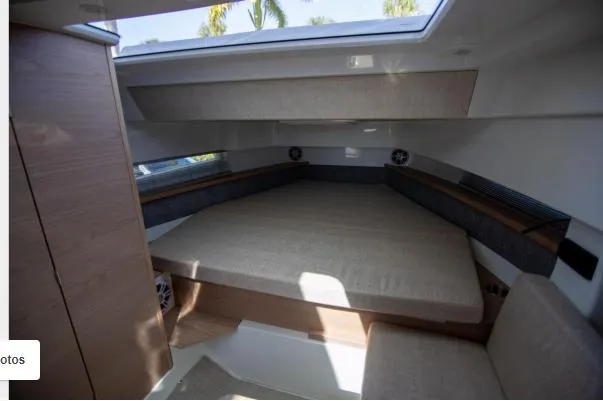 Slide: The Image of Interior cabin of 2025 Quarken 35 boat with modern design and comfortable bedding. - 17