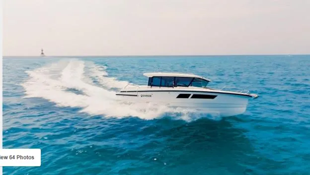 Slide: The Image of 2025 Quarken 35 boat cruising on open blue sea. - 2