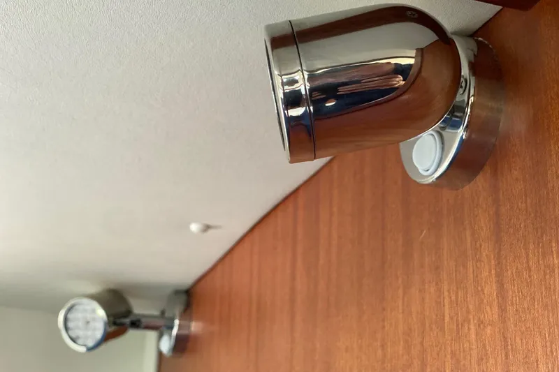 Slide: The Image of Chrome spotlights on a NorthCoast 315 boat, 2022 model. - 24