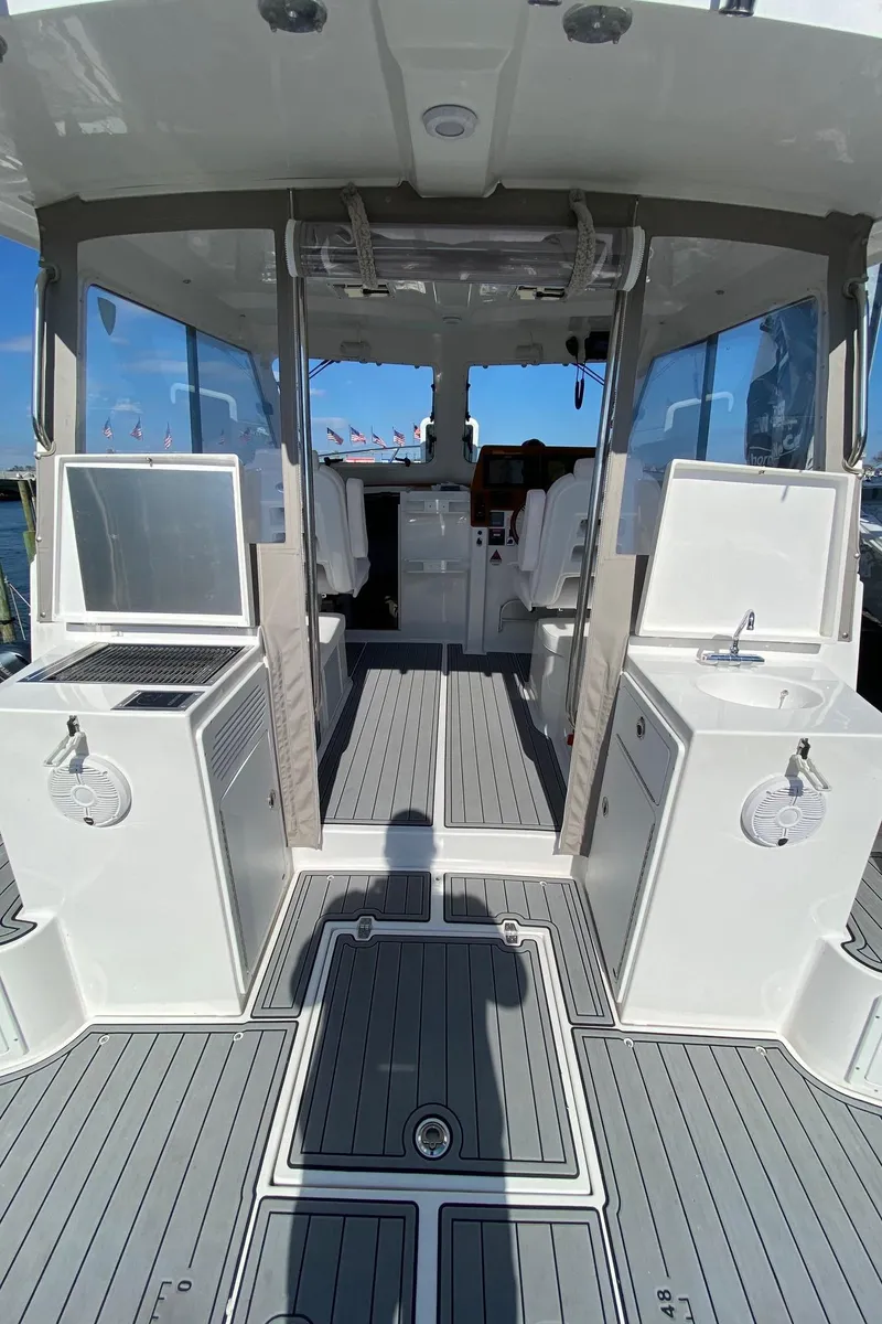 Slide: The Image of 2022 NorthCoast 315 boat interior with modern amenities and spacious layout. - 7