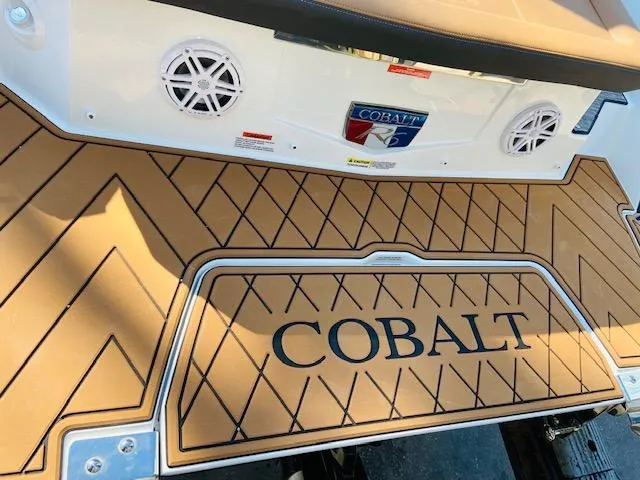 Slide: The Image of 2023 Cobalt R6 boat deck with logo and speakers. - 11