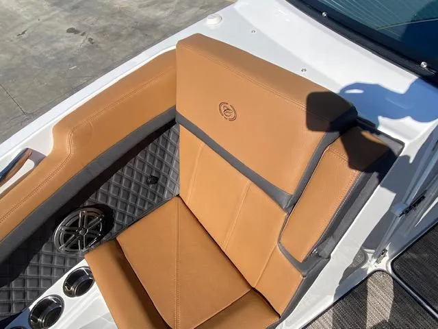 Slide: The Image of 2023 Cobalt R6 boat with tan leather seating and diamond-stitched accents. - 25