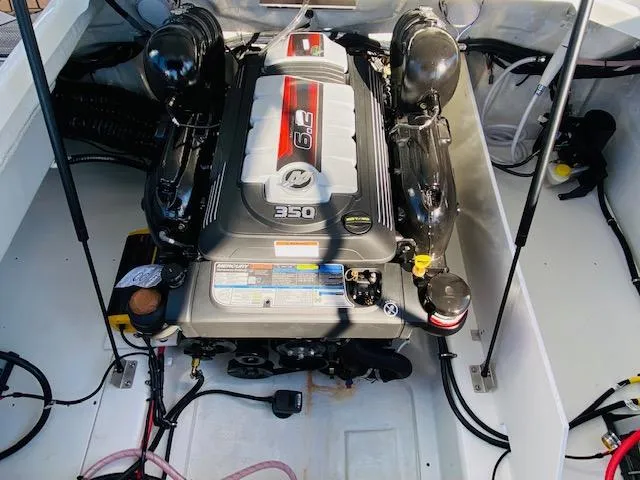 Slide: The Image of 2023 Cobalt R6 boat engine compartment with 6.2L 350 horsepower engine. - 27