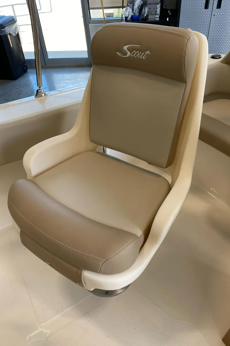 Slide: The Image of 2024 Scout 195 Dorado boat seat in beige and cream. - 6