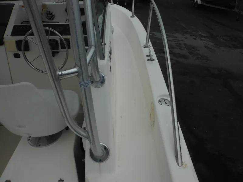 Slide: The Image of 1997 Robalo 2140 Walkaround boat deck and steering console. - 11