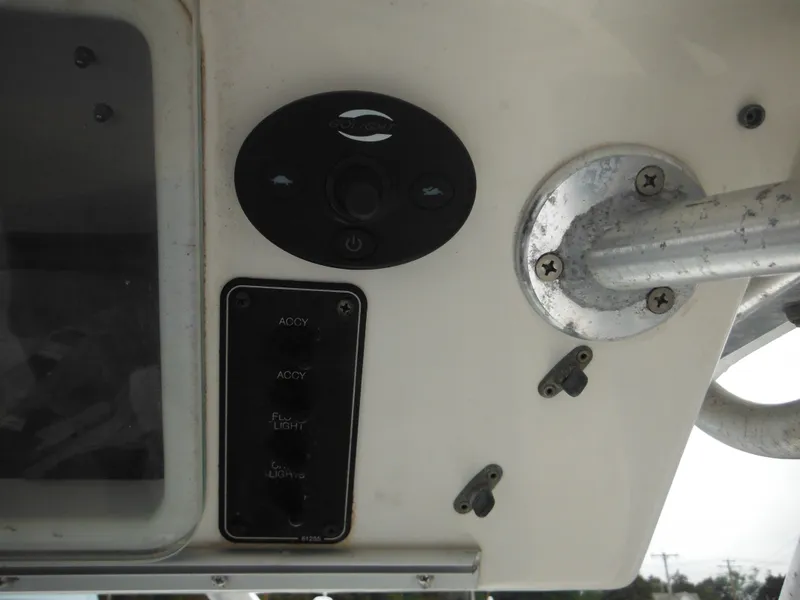 Slide: The Image of Control panel of a 1997 Robalo 2140 Walkaround boat. - 23
