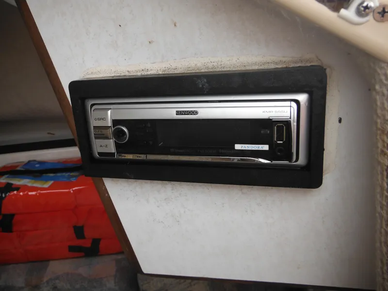 Slide: The Image of Built-in stereo system in a 1997 Robalo 2140 Walkaround boat. - 26