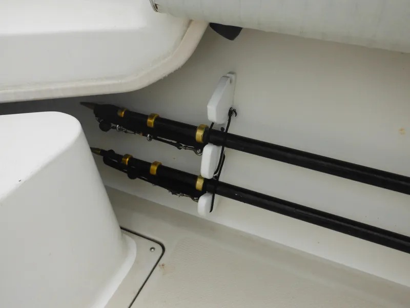 Slide: The Image of Fishing rod holders on a 1997 Robalo 2140 Walkaround boat. - 35
