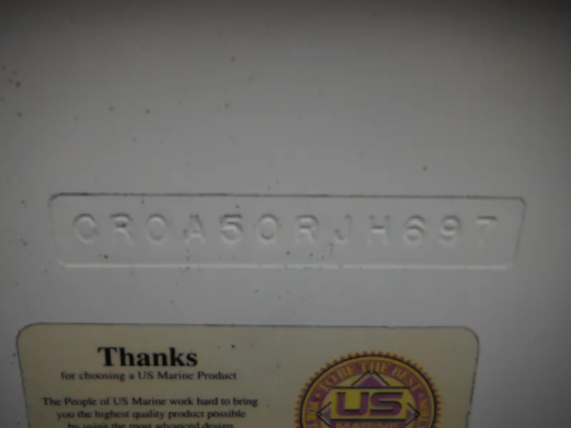 Slide: The Image of 1997 Robalo 2140 Walkaround HIN plate and US Marine product label. - 7