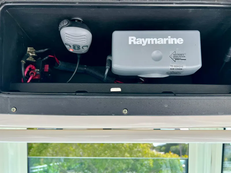 Slide: The Image of Raymarine equipment and radio in a 2015 Boston Whaler 250 Outrage boat. - 22