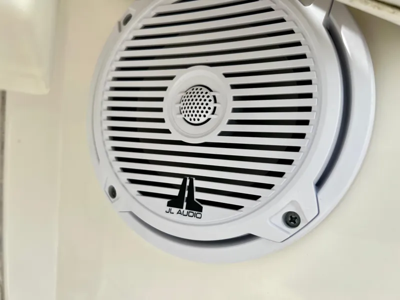 Slide: The Image of JL Audio speaker on a 2015 Boston Whaler 250 Outrage boat. - 26