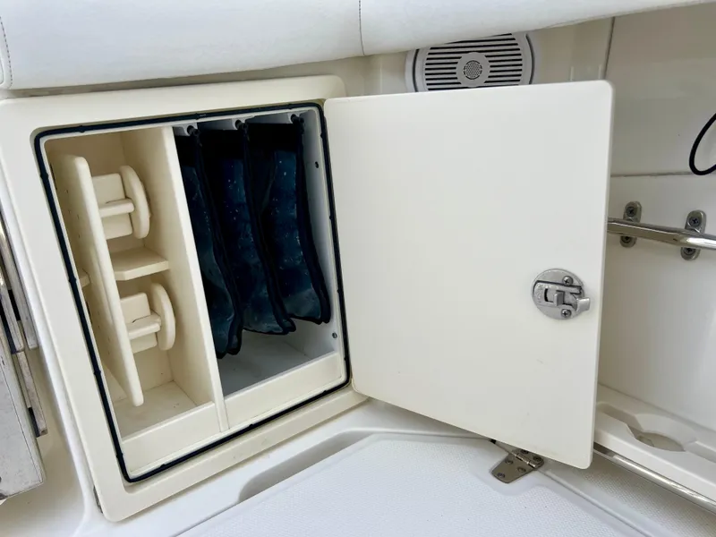Slide: The Image of Storage compartment on a 2015 Boston Whaler 250 Outrage boat. - 30