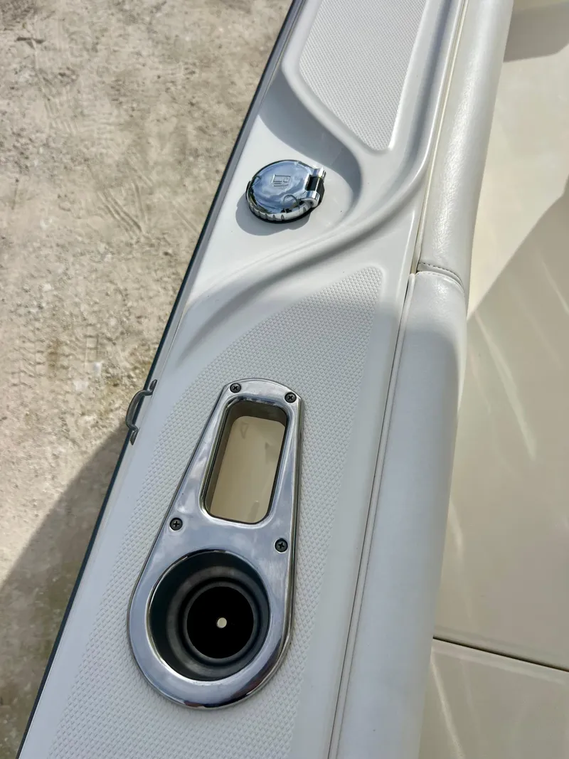 Slide: The Image of Close-up of a 2015 Boston Whaler 250 Outrage boat control panel. - 33