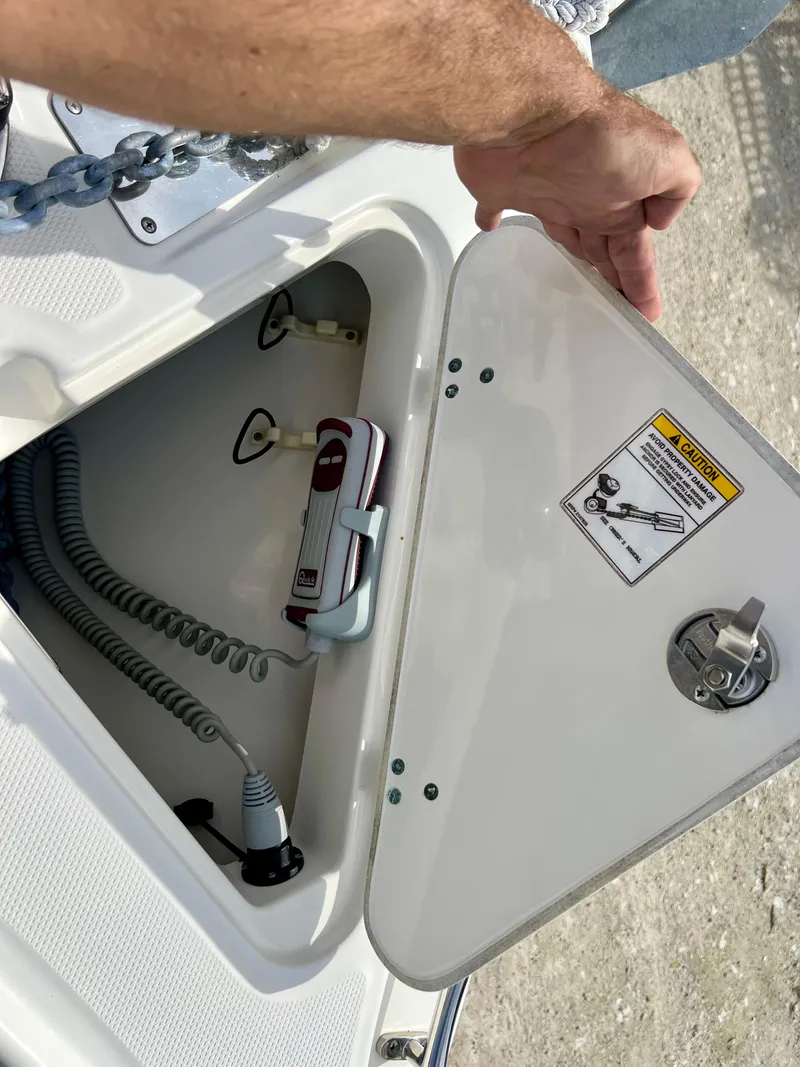 Slide: The Image of Storage compartment on a 2015 Boston Whaler 250 Outrage boat. - 41