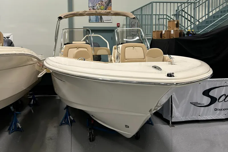 Slide: The Image of 2024 Scout 195 Dorado boat on display in showroom. - 3