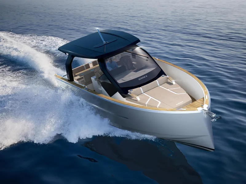 The Image of 2024 Fjord 39XP luxury yacht cruising on open water, showcasing sleek design and modern features. - 1