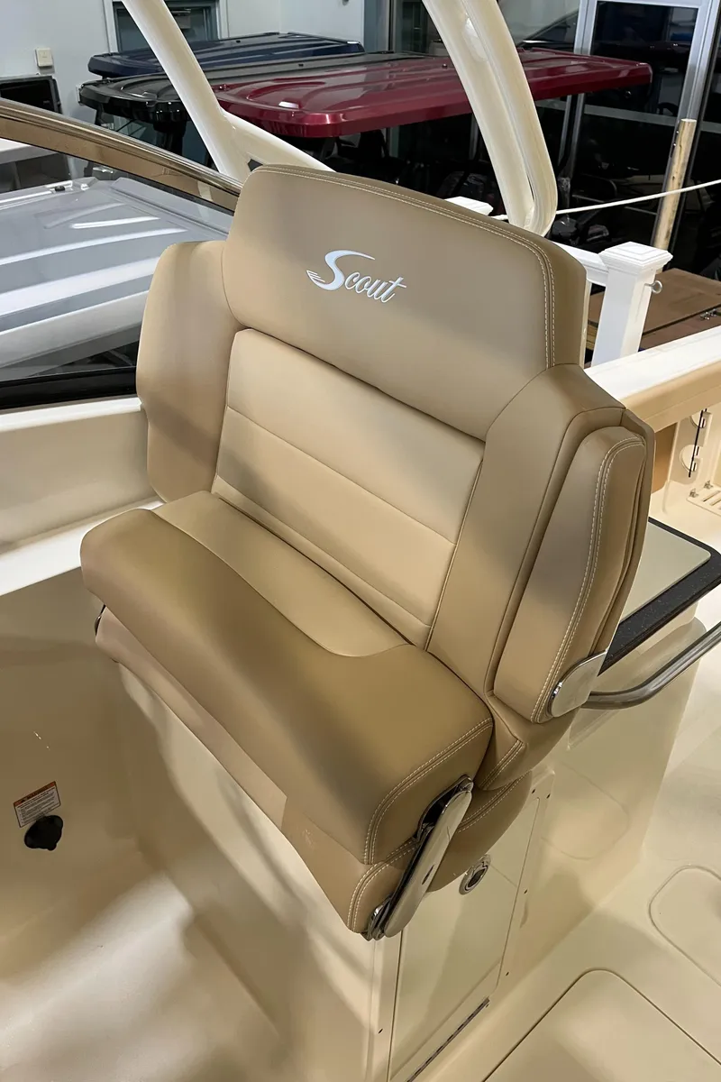Slide: The Image of 2024 Scout 255 Dorado boat seat with beige upholstery. - 12