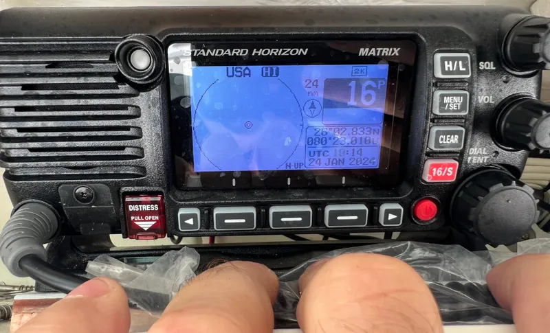 Slide: The Image of Standard Horizon Matrix radio on a 2014 Cobia 296 Center Console boat. - 31