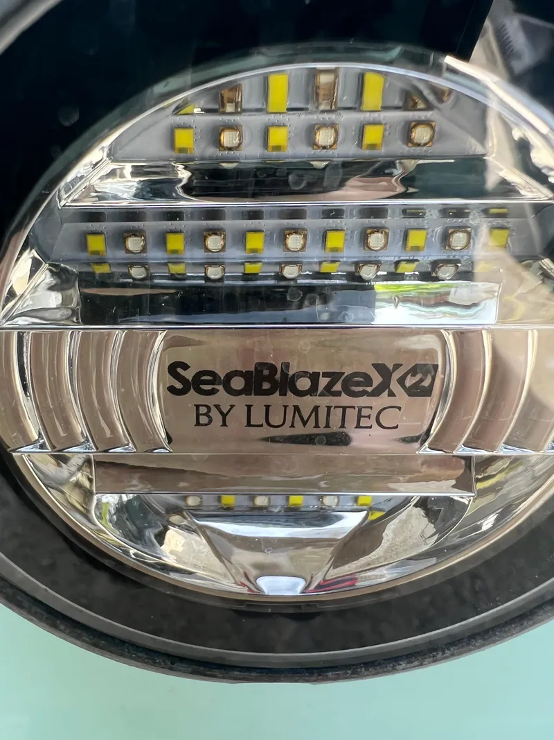 Slide: The Image of Close-up of SeaBlazeX by Lumitec LED light on 2014 Cobia 296 Center Console. - 40