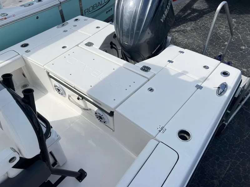 Slide: The Image of 2024 Robalo 246 Cayman boat deck with Yamaha outboard motor. - 13