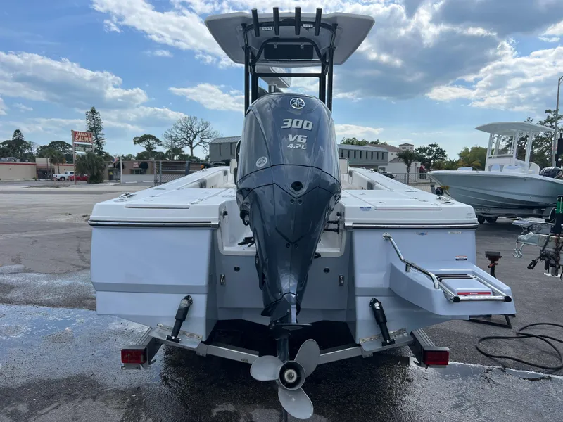 Slide: The Image of 2024 Robalo 246 Cayman boat with Yamaha 300 V6 engine, rear view. - 3