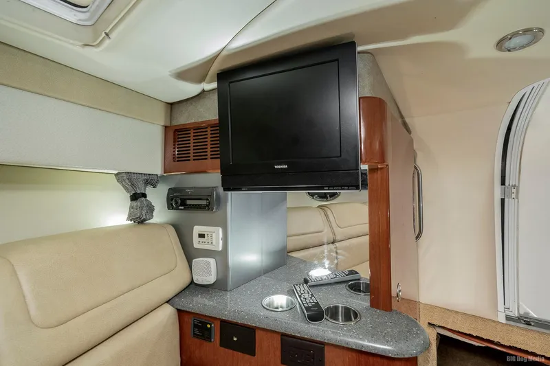 Slide: The Image of Interior of 2008 Formula 310 Sun Sport with TV, control panel, and seating. - 18