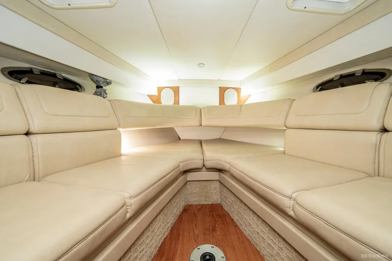 Slide: The Image of Interior of 2008 Formula 310 Sun Sport boat with beige leather seating. - 20