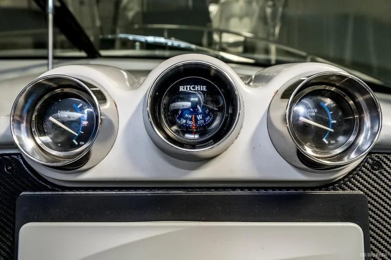 Slide: The Image of Dashboard gauges of a 2008 Formula 310 Sun Sport boat. - 23