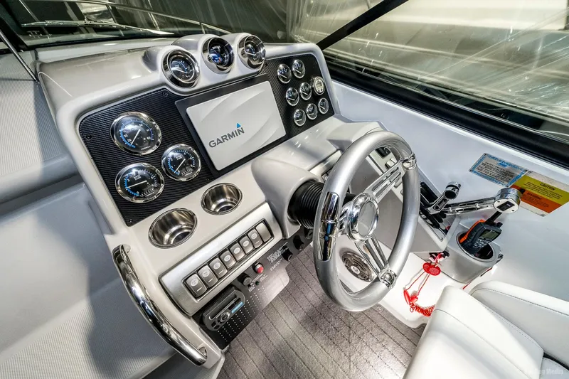 Slide: The Image of 2008 Formula 310 Sun Sport boat helm with Garmin navigation system. - 28