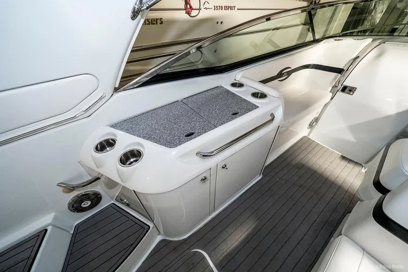 Slide: The Image of 2008 Formula 310 Sun Sport boat interior with sleek design and ample storage. - 30
