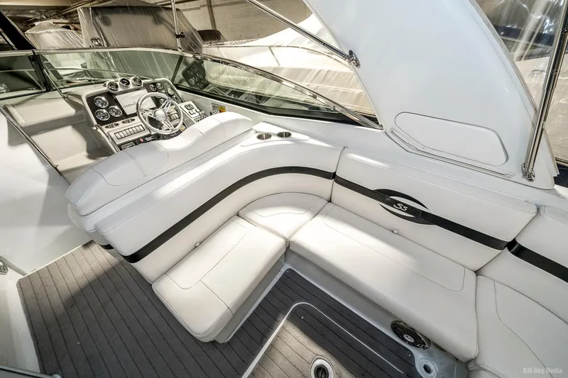 Slide: The Image of 2008 Formula 310 Sun Sport boat interior with white leather seating and modern dashboard. - 39