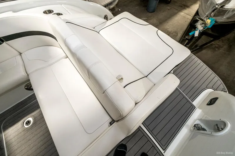 Slide: The Image of 2008 Formula 310 Sun Sport boat with white leather seating and gray deck. - 41