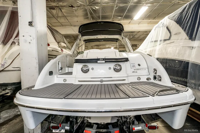 Slide: The Image of 2008 Formula 310 Sun Sport boat in storage, rear view. - 45