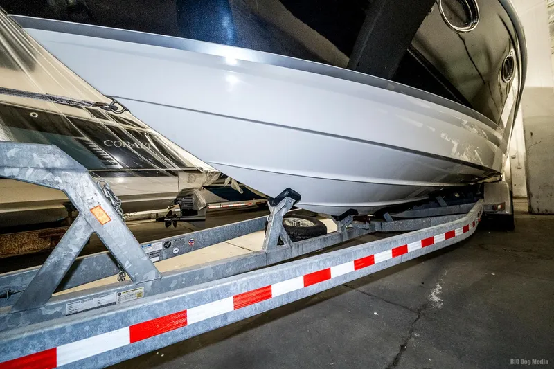 Slide: The Image of 2008 Formula 310 Sun Sport boat on a trailer in a storage facility. - 46
