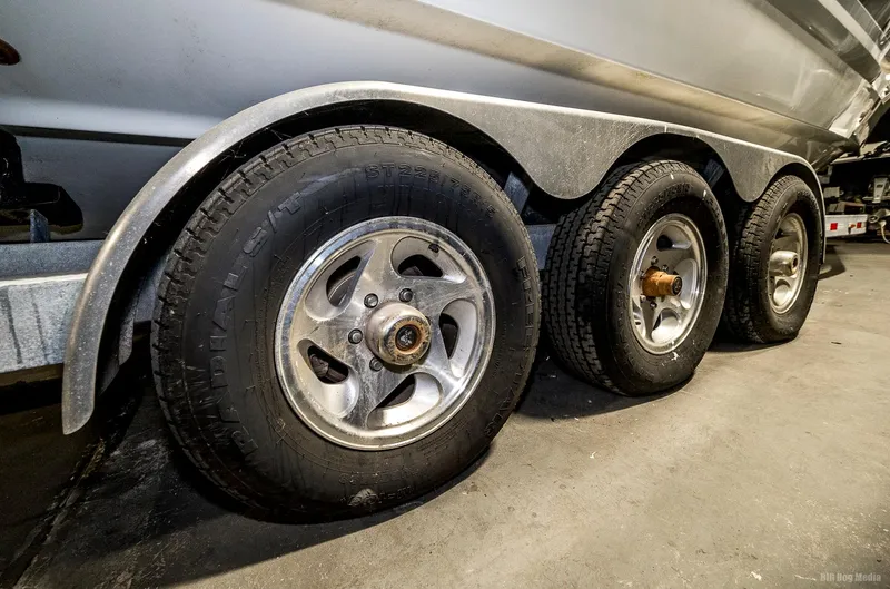 Slide: The Image of 2008 Formula 310 Sun Sport trailer with triple axle wheels. - 48