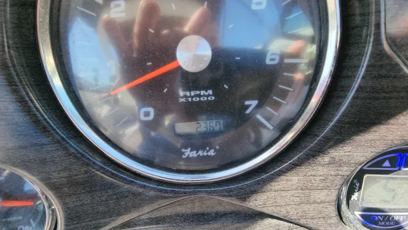 Slide: The Image of Close-up of 2018 Rinker QX 26 boat tachometer showing 3600 RPM. - 36