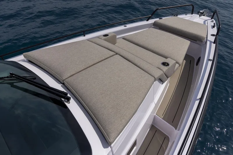 Slide: The Image of 2024 Axopar 37 Sun Top Mediterrana Edition boat with spacious sunbathing area. - 39