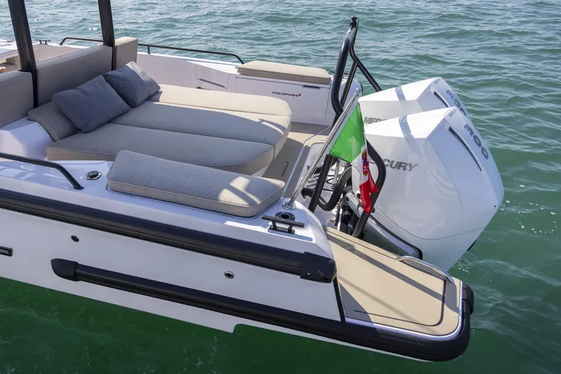 Slide: The Image of 2024 Axopar 37 Sun Top Mediterrana Edition with Mercury engine, rear sunbed, and cushions. - 46