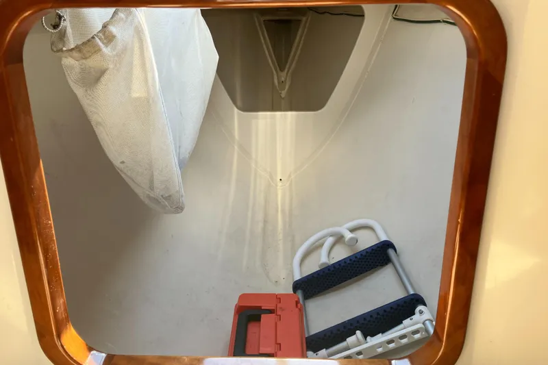 Slide: The Image of Interior storage compartment of a 2012 Morris M29 boat with equipment. - 11