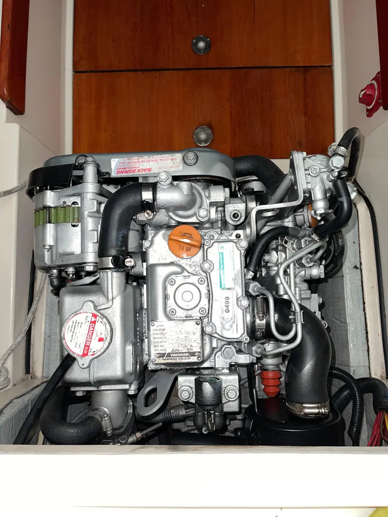 Slide: The Image of 2012 Morris M29 engine in a boat compartment. - 12