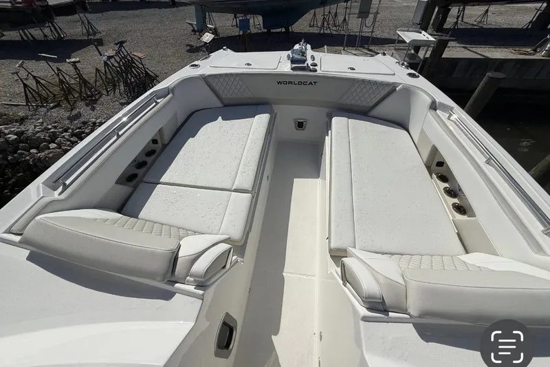 Slide: The Image of 2026 World Cat 325 DC boat interior with spacious seating and modern design. - 4