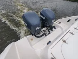 Slide: The Image of 2001 Century 3200 Walk-Around boat with twin Yamaha 250 outboard engines. - 27