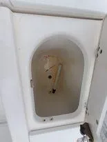 Slide: The Image of 2001 Century 3200 Walk-Around boat storage compartment. - 32