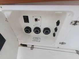 Slide: The Image of Control panel of a 2001 Century 3200 Walk-Around boat. - 33