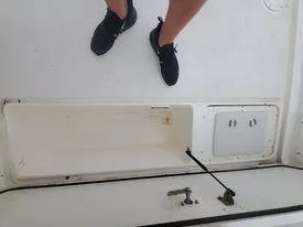 Slide: The Image of 2001 Century 3200 Walk-Around boat interior compartment and deck. - 35