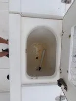 Slide: The Image of 2001 Century 3200 Walk-Around boat storage compartment. - 38