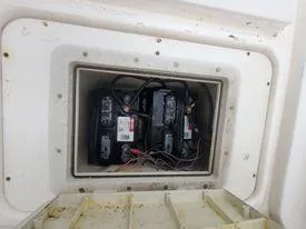 Slide: The Image of Battery compartment of a 2001 Century 3200 Walk-Around boat. - 39