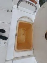 Slide: The Image of 2001 Century 3200 Walk-Around boat storage compartment open - 45