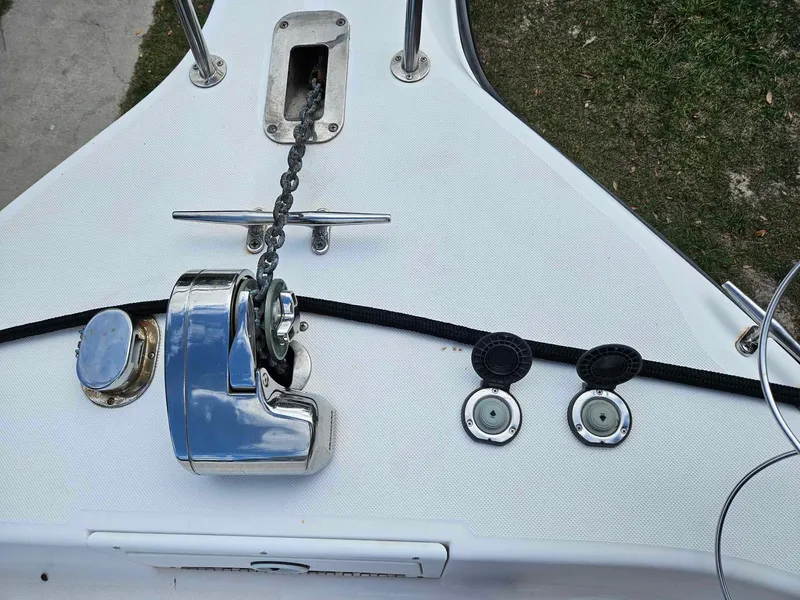 Slide: The Image of 2001 Century 3200 Walk-Around boat anchor and chain mechanism. - 8